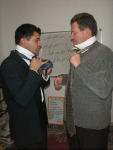 Teaching Amer to Tie His Tie